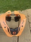 Atlas Air Neck Brace Orange Tyke. Fixed Price $75.00.