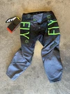 Fly Racing Youth Kinetic Prodigy Pants Char/neon Green/blue Sz 377-53618. Fixed Price $50.00.