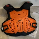 Leatt Youth Chest Protector For Kids 58 62.5 Inches- L/xl Orange/blk. Fixed Price $67.00.