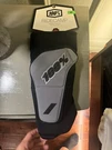 100% Ridecamp Knee Guards (medium). Fixed Price $45.00.